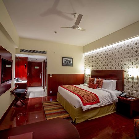 Hotel Ramada By Wyndham Jaipur Jaisinghpura Extérieur photo
