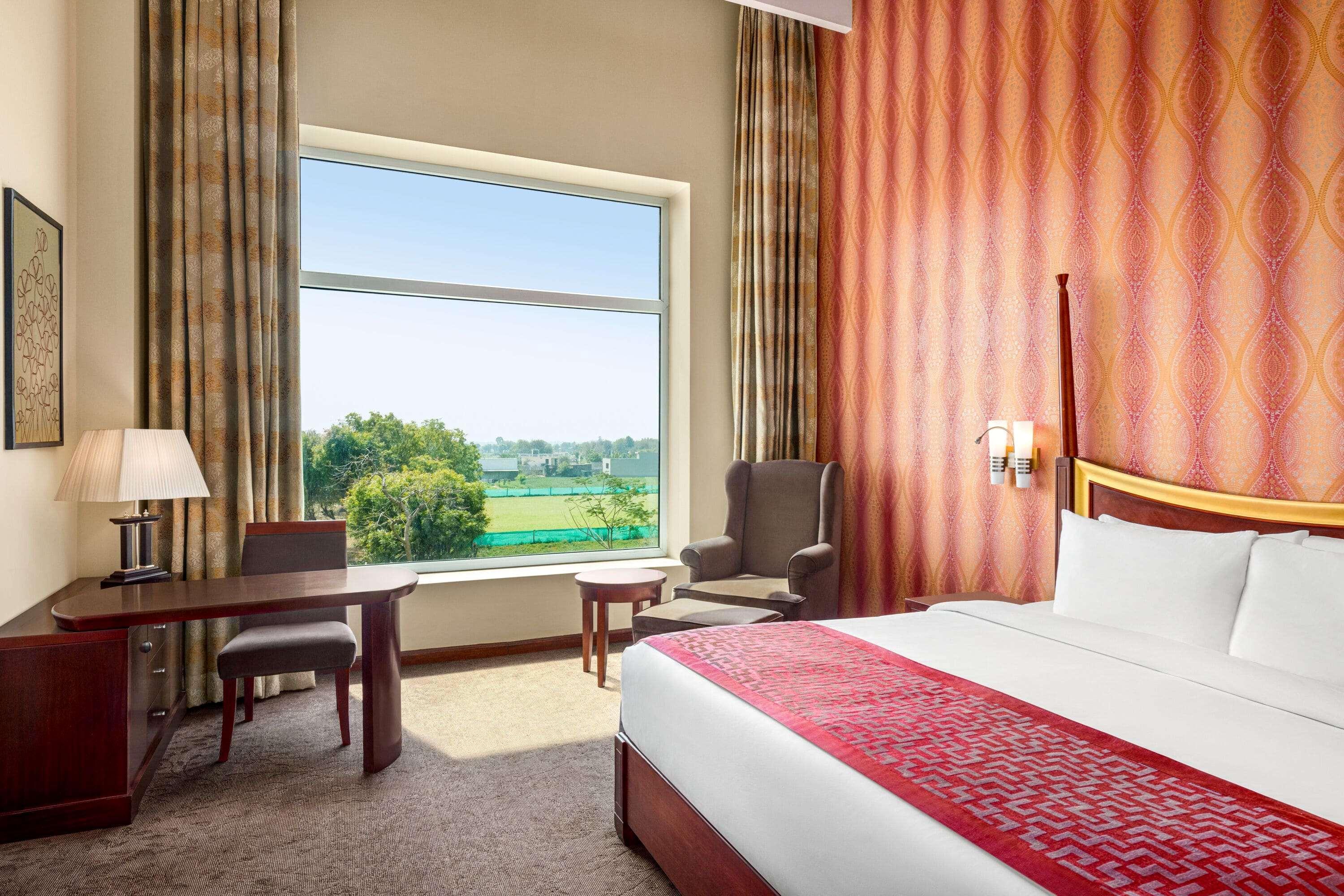 Hotel Ramada By Wyndham Jaipur Jaisinghpura Extérieur photo